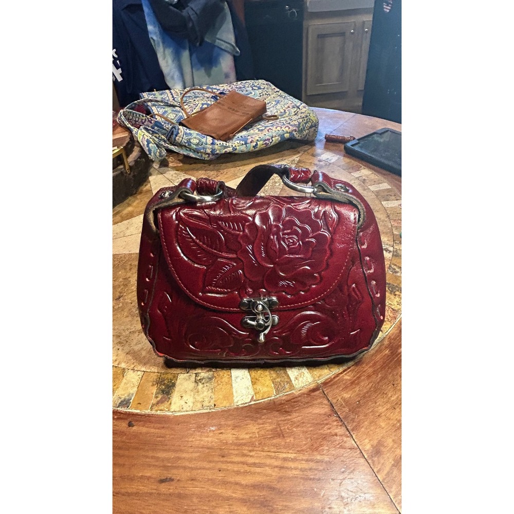 Patricia Nash Rose Tooled Vintage Veg Tan Leather Crossbody Bag Ruby Red P732347